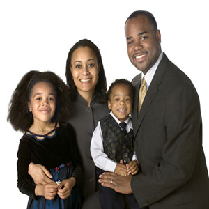 A portrait of the black family unit, but the odds are against many African-American women and their children having this picture perfect life. Photo Credit: blackloveandmarriage.com
