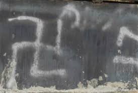 NYPD officer spray painted anti-Semitic graffiti. Photo Credit: israelnationalnews.com